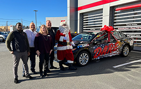 IRA TOYOTA OF DANVERS presents Danvers Police Department D.A.R.E. program with their new 2023 Toyota Camry